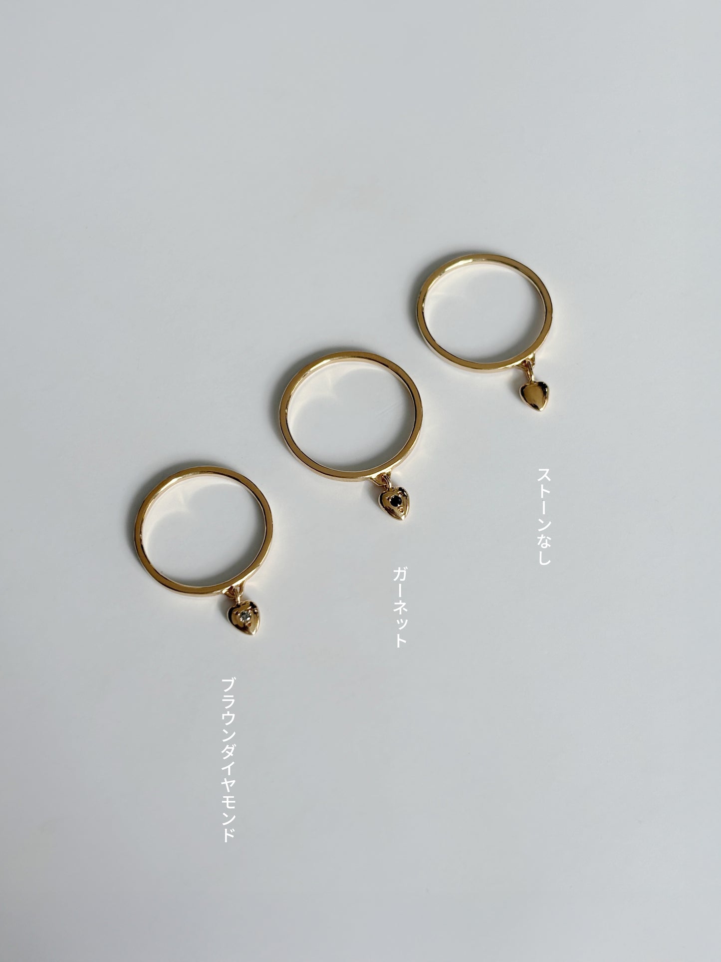 Mini round heart swing ring with stone