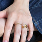 Twist loop ring