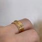 Twist loop ring